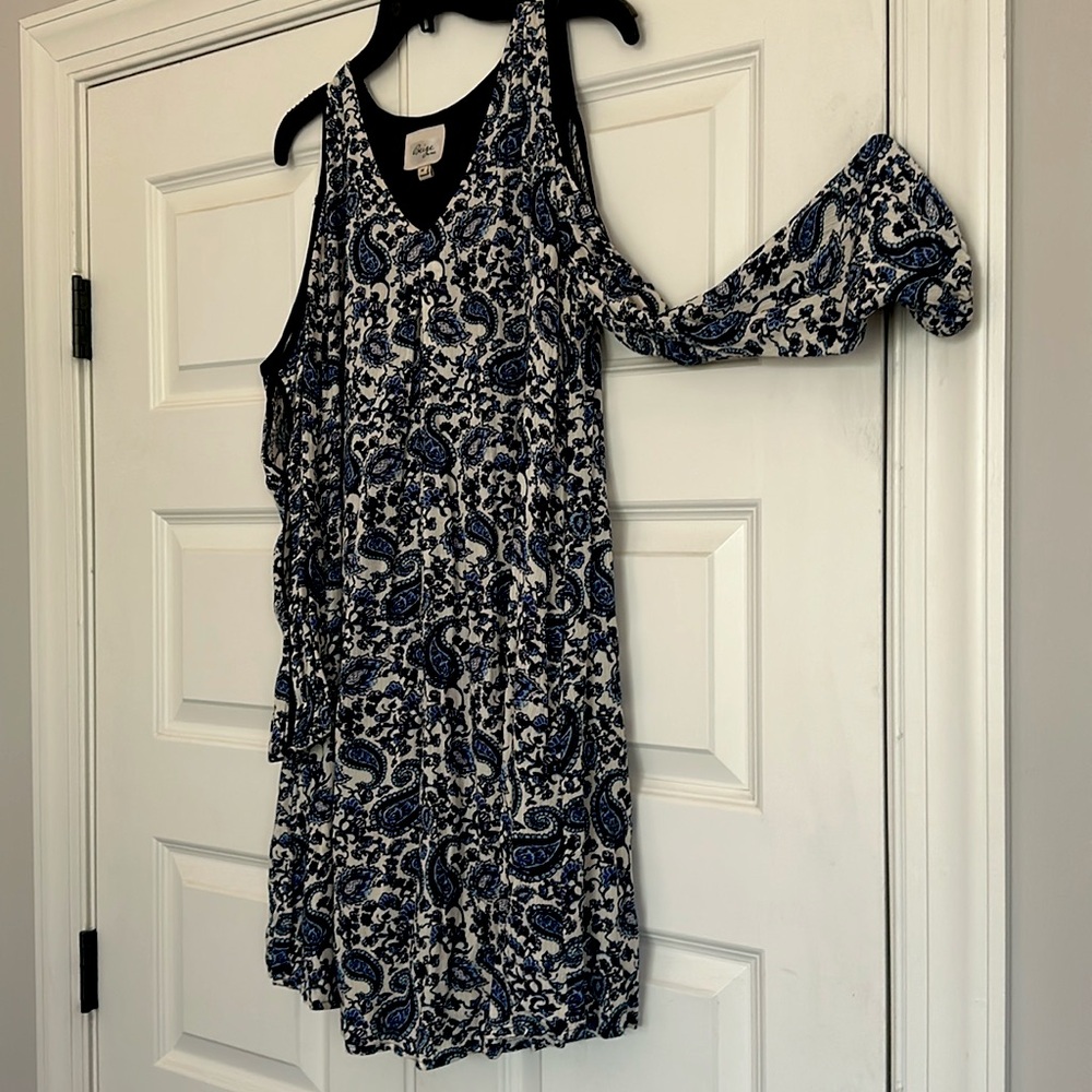 Beige by Eci navy patterned dress with arm cutouts. Size medium